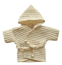 Ein Bademantel von Minikane. Entworfen und hergestellt für die Kollektion Baby